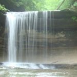 A waterfall flows at Staved Rock State Park